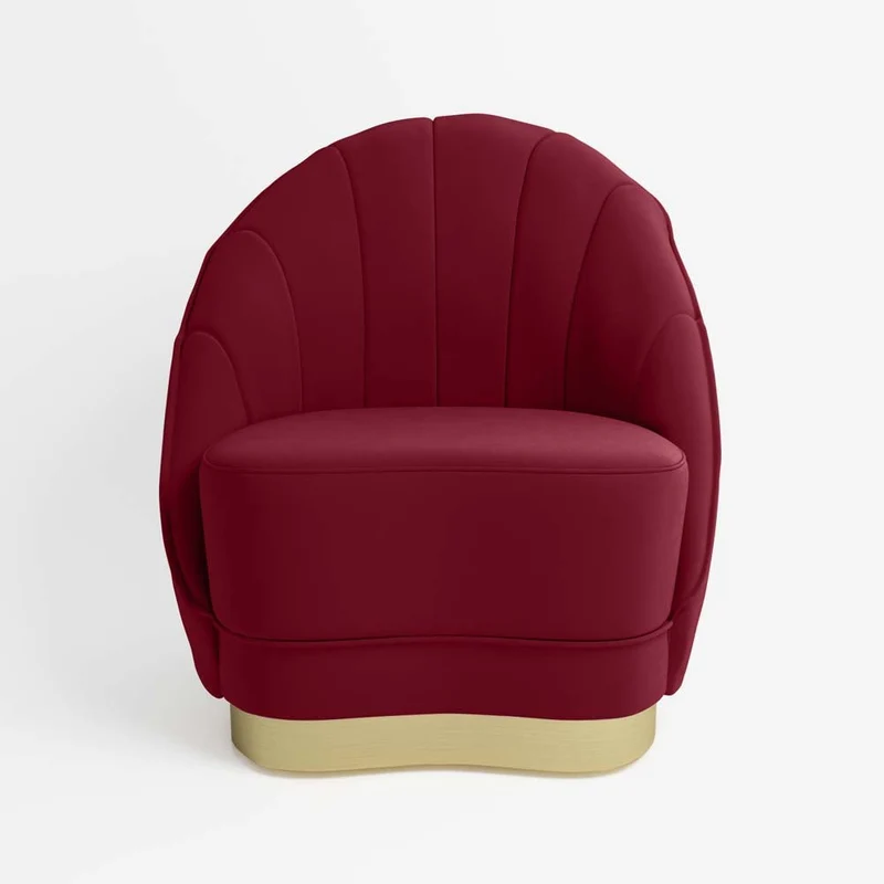 Fauteuil en velours bordeaux, base cerclage dor effet laiton