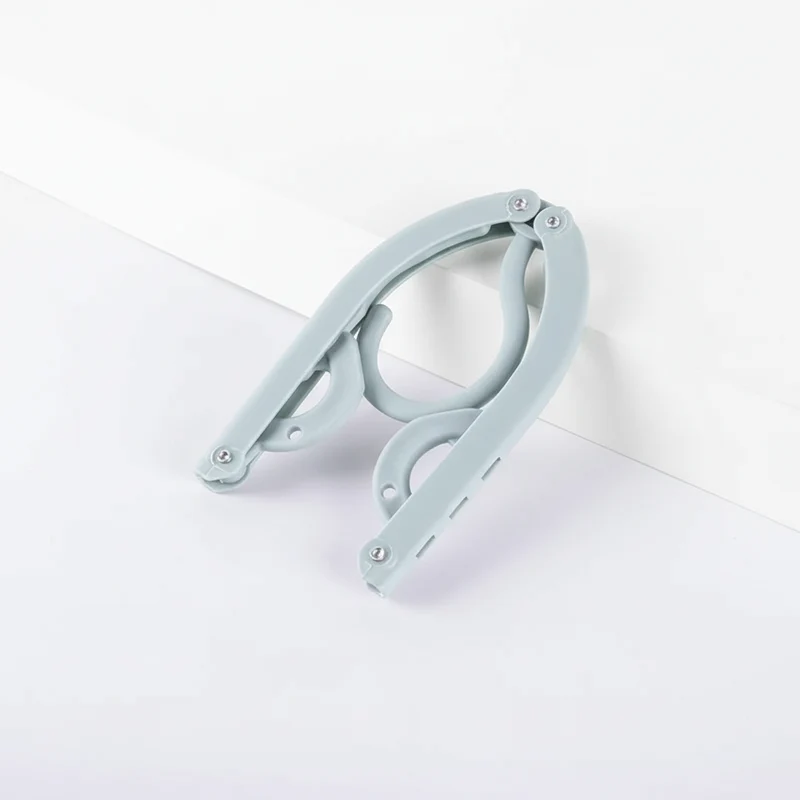 Petit étendoir à linge pliable de voyage