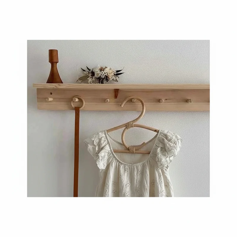 Cintre pour étendoir à linge en rotin naturel
