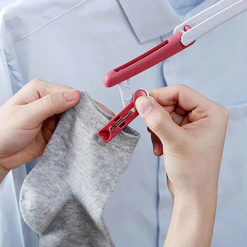 Cintre pour étendoir à linge pliable de voyage