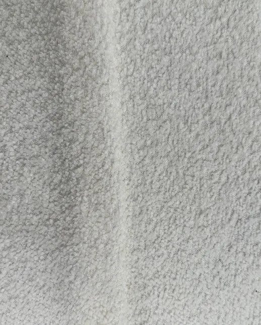Fauteuil avec repose-pieds bouclé