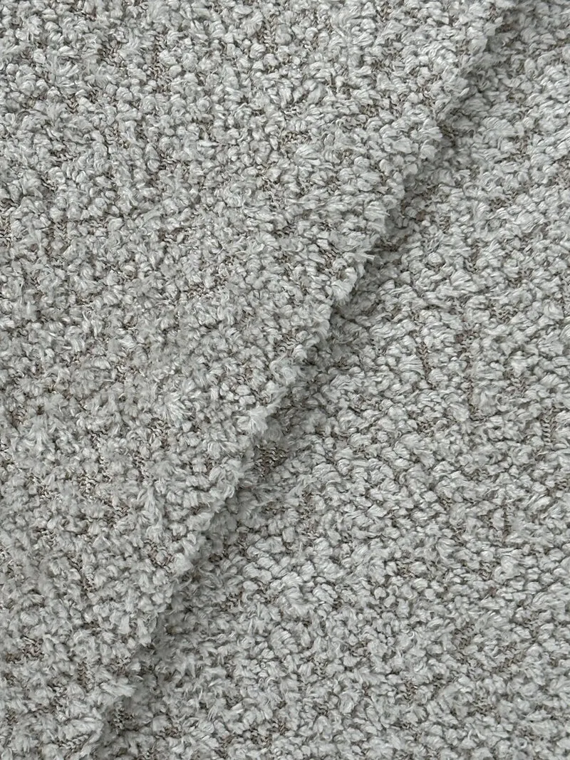 Fauteuil avec repose-pieds bouclé