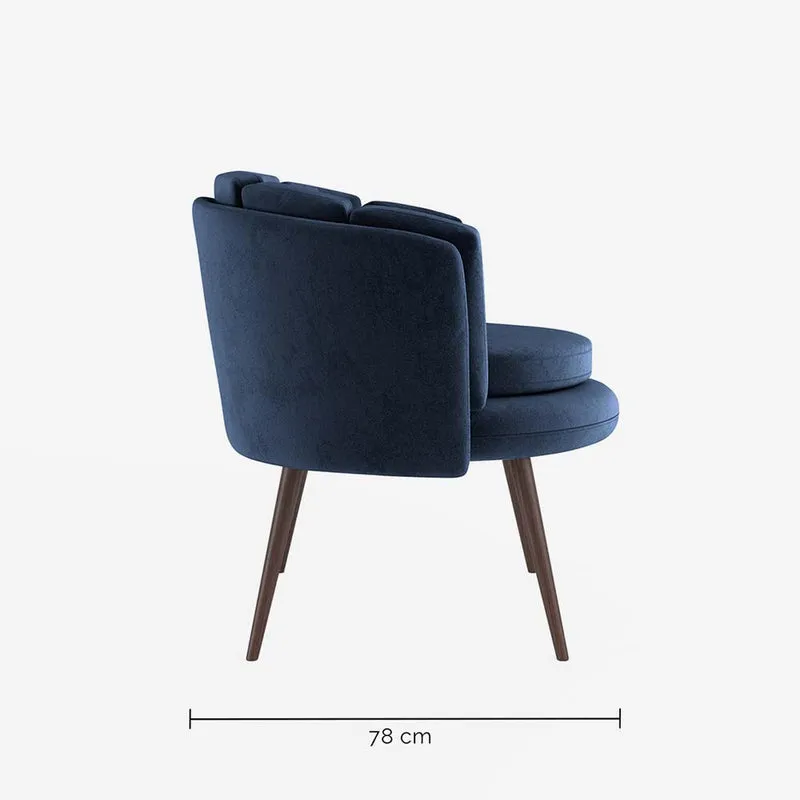 Fauteuil en velours bleu nuit