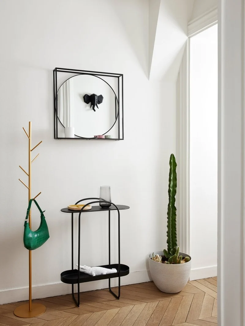 Miroir à formes géométriques en métal noir