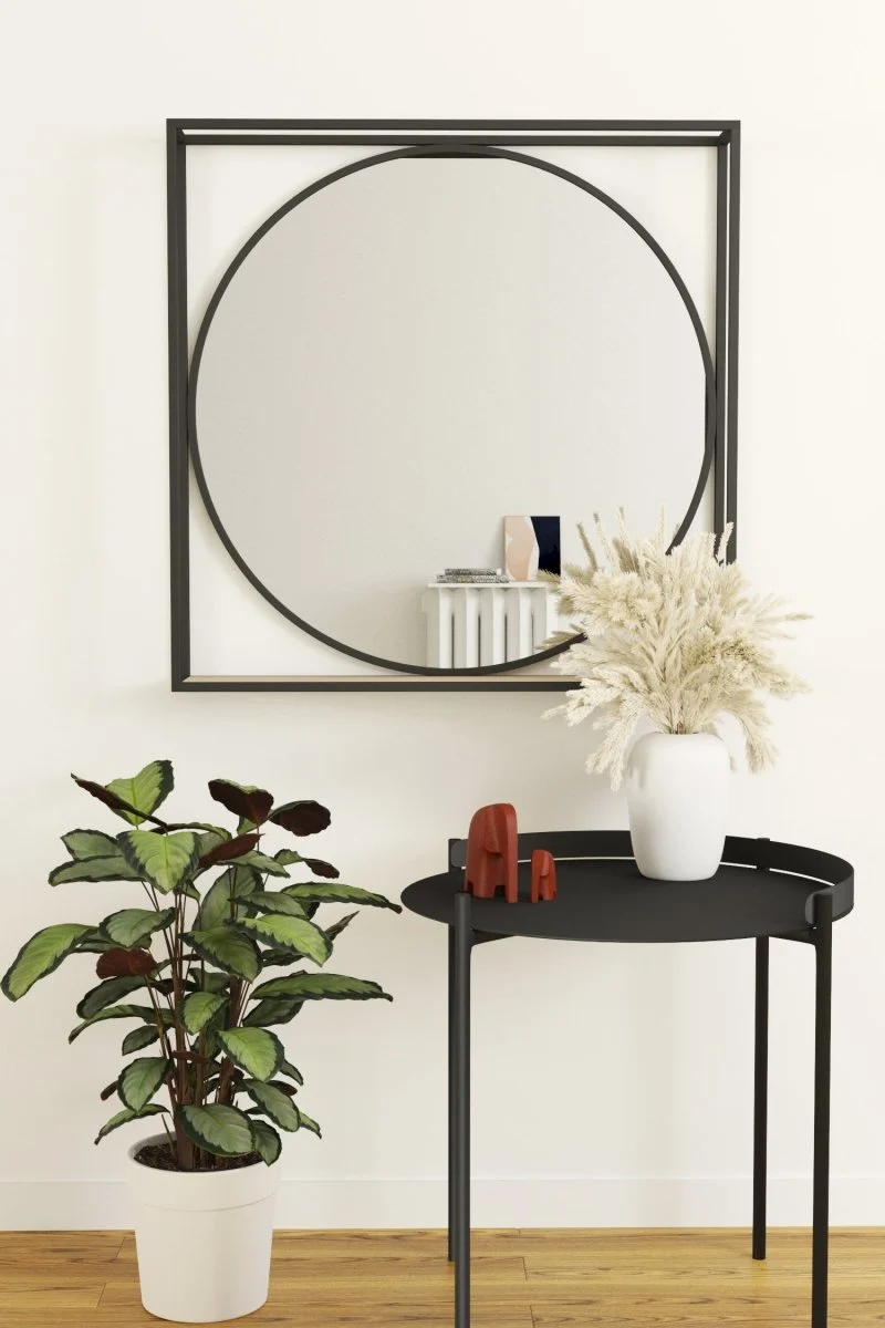 Miroir à formes géométriques en métal noir