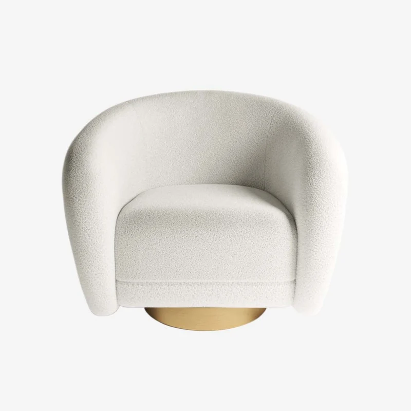 Fauteuil effet laine bouclée et laiton