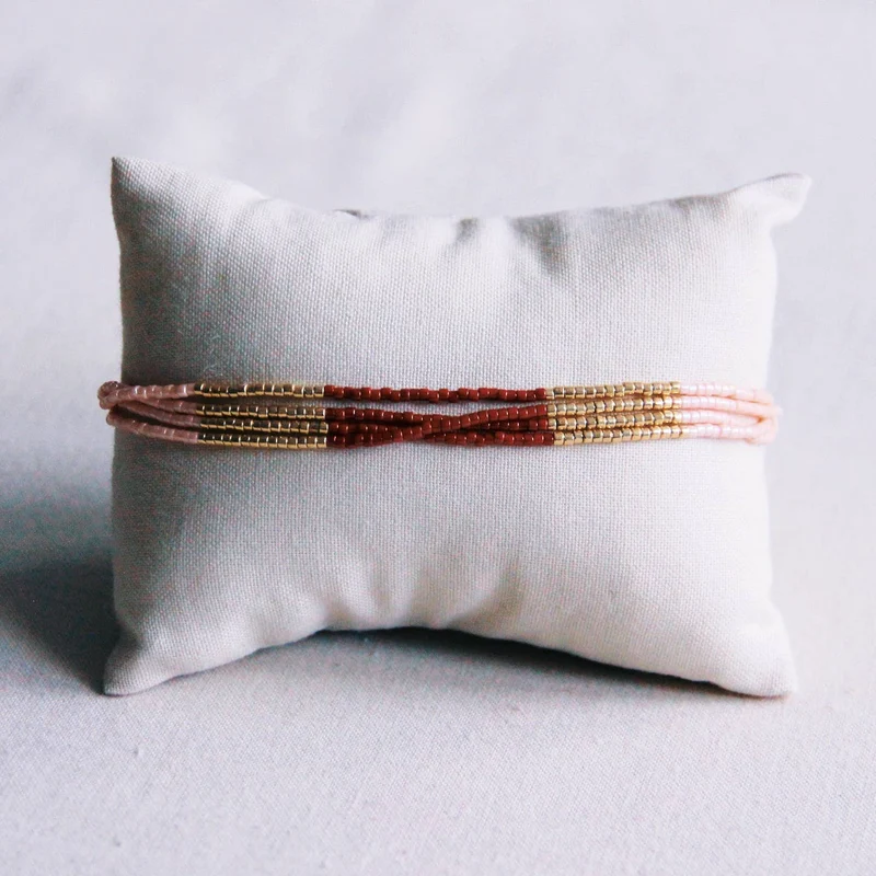 BRACELET EN PERLES - bordeaux/lnude/doré
