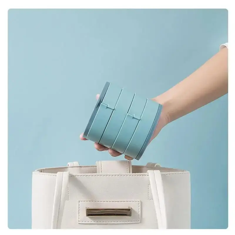 Présentoir à bijoux en plastique rotatif