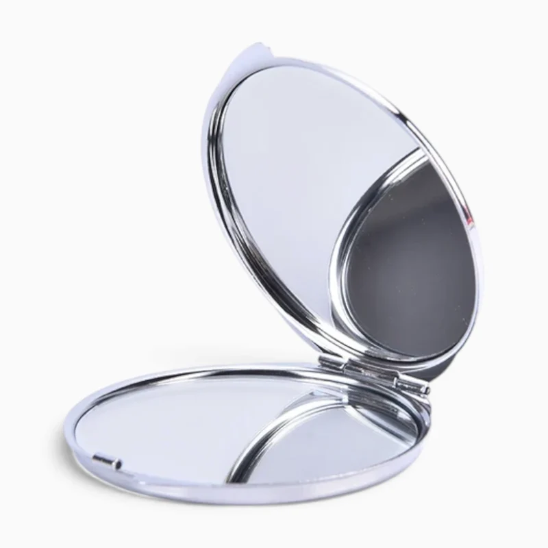 Miroir de poche grossissant