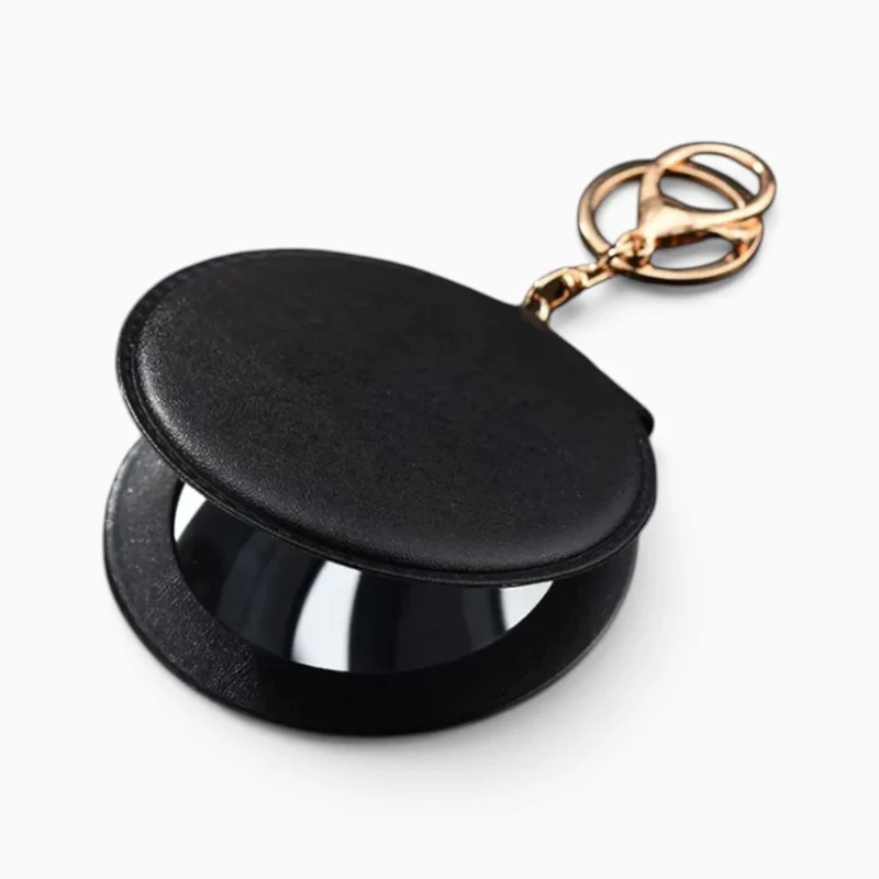 Miroir de poche grossissant