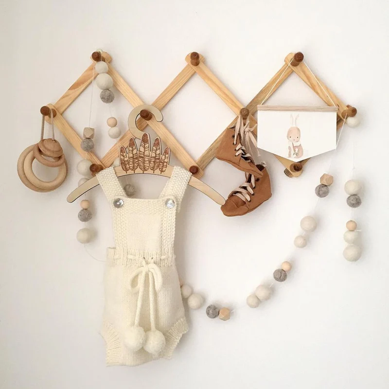 Cintre de porte-manteau accordéon en bois extensible