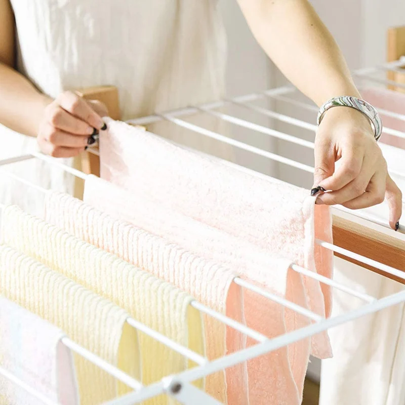 Étendoir à linge pliant en bois pour économiser de l'espace