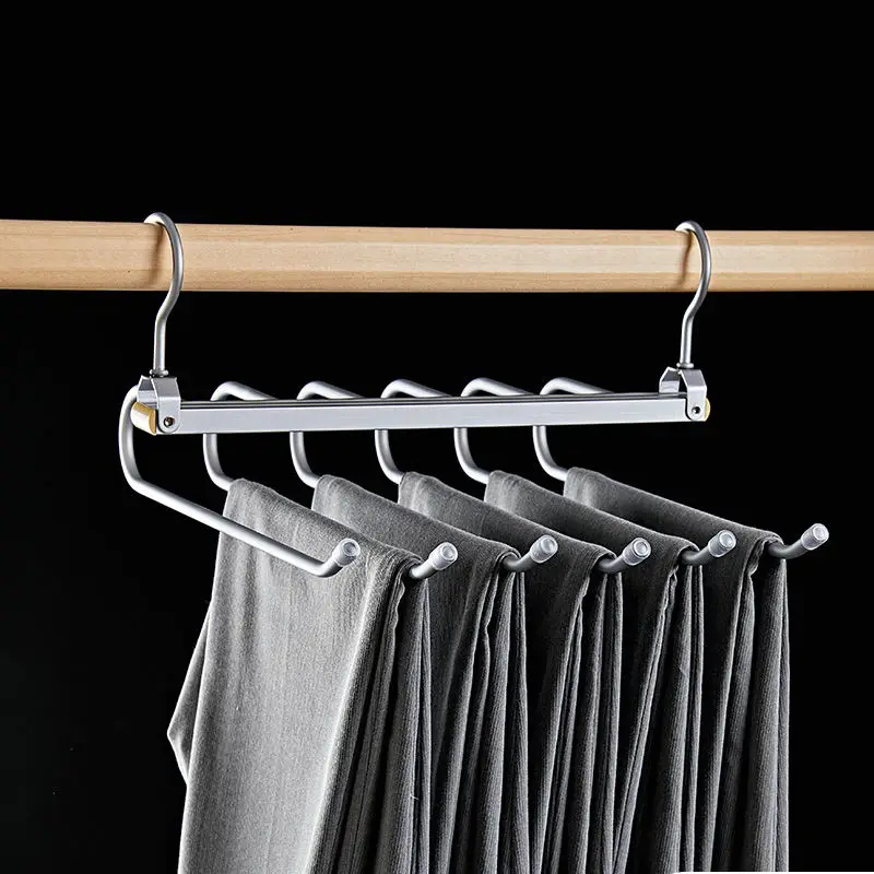 Porte-pantalons « magique » 6-en-1 en acier inoxydable — rotatif et pliable