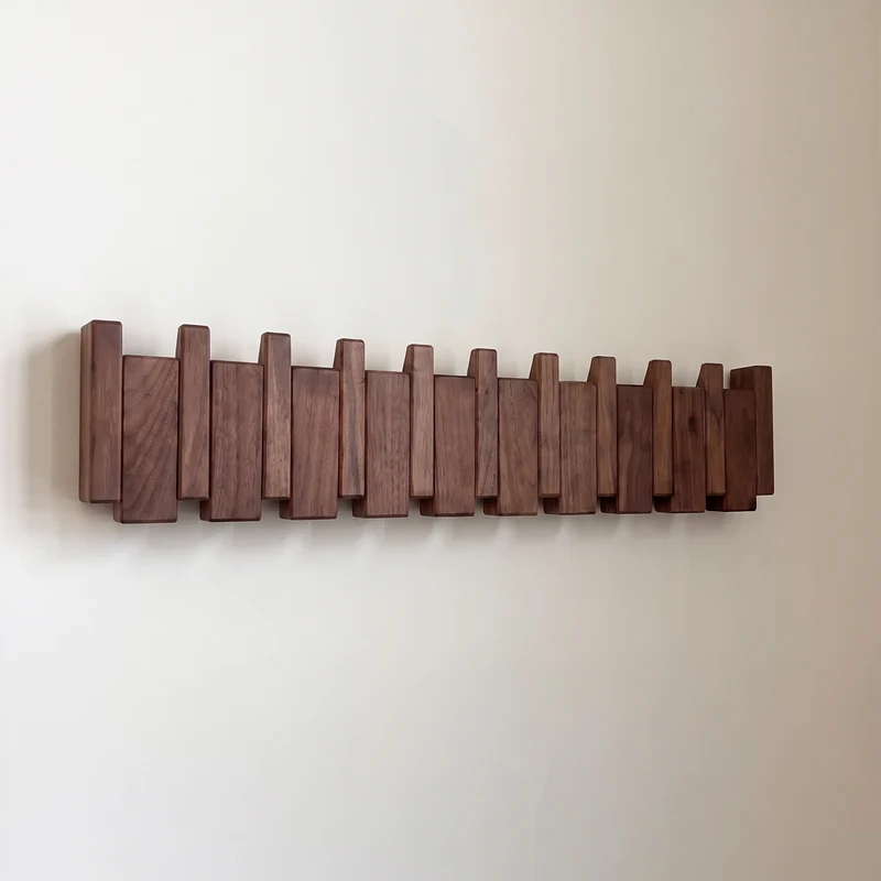 Wooden Coat Rack with Streamlined Piano Design and Integrated Hooks