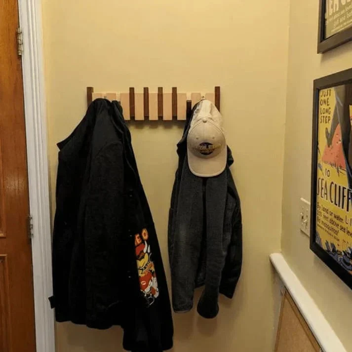 Wooden Coat Rack with Streamlined Piano Design and Integrated Hooks